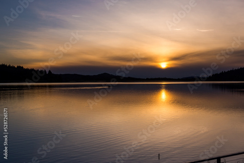 Beautiful misty sunset over the lake. Dexter reservoir, Oregon, USA