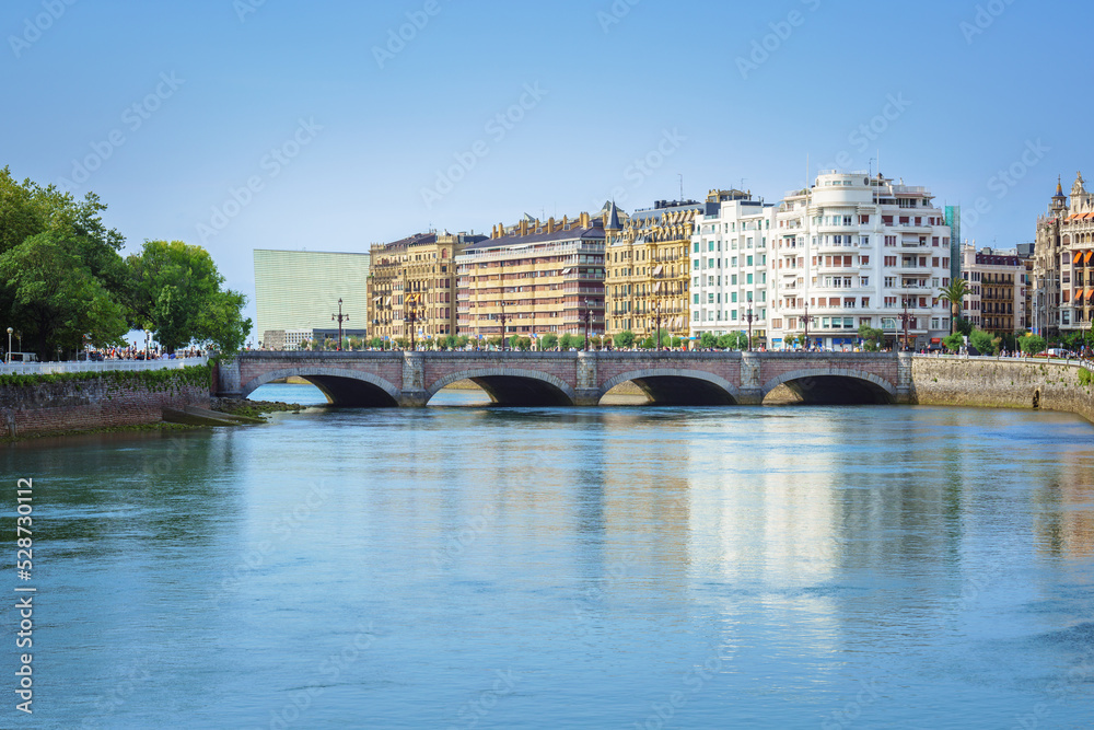 Fototapeta premium San Sebastian Donostia city landscape with the Urumea River and Santa Catalina bridge
