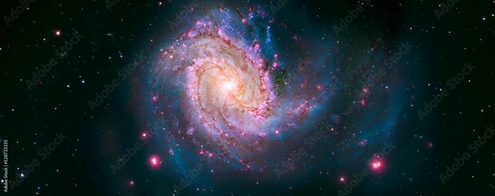 A spiral galaxy and stars in space. Elements of the image furnished by NASA.