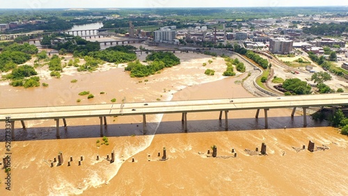 James River in Richmond, VA at flood level after rain from extreme weather in the South USA photo