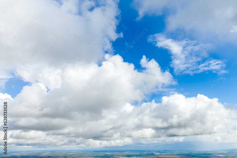 Cloudy sky on a daytime. Cumulus and altocumulus clouds Cloudy sky on a daytime. Cumulus and altocumulus clouds