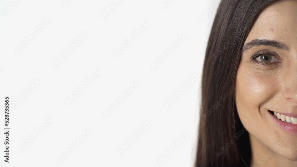 cropped view of happy woman looking at camera isolated on white with copy space cropped view of happy woman looking at camera isolated on white with copy space