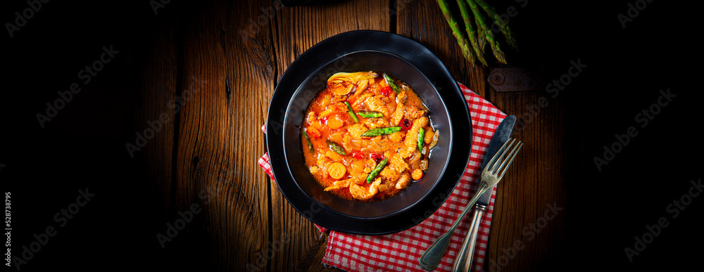 colorful turkey fricassee with asparagus and paprika colorful turkey fricassee with asparagus and paprika