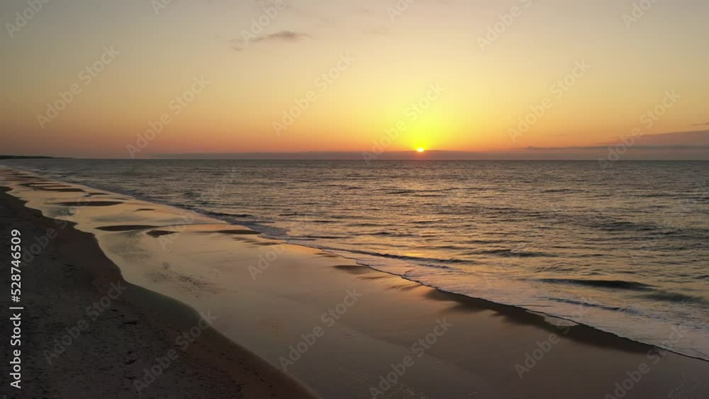 Nature's beauty displayed as sun rises over ocean at the beach in coastal South Carolina during summer on vacation Nature's beauty displayed as sun rises over ocean at the beach in coastal South Carolina during summer on vacation