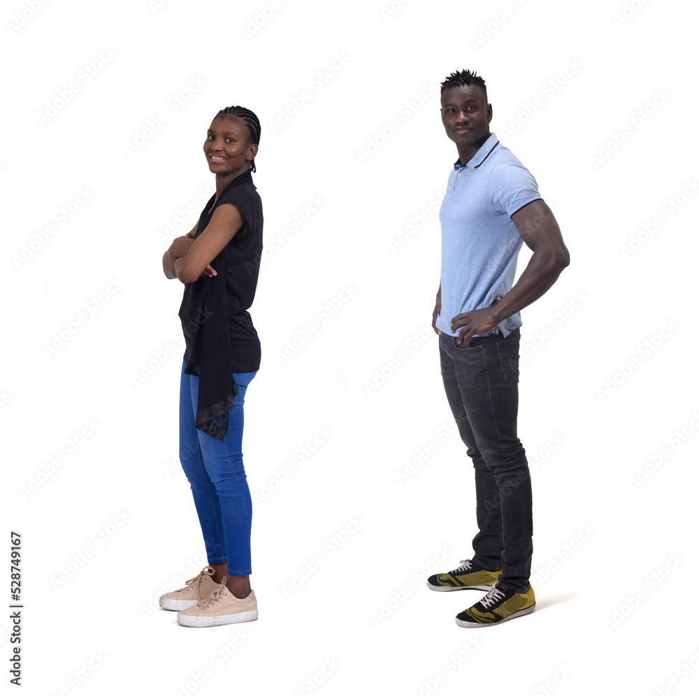 side view of a couple standing over white background