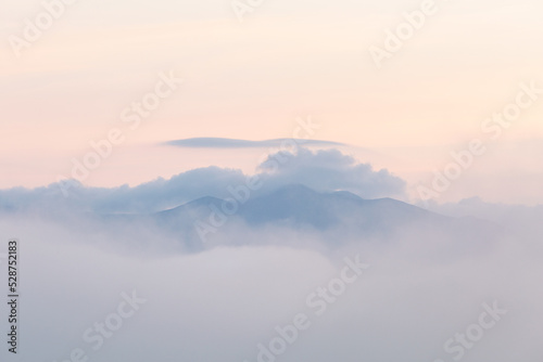 Mala Fatra mountain range shrouded in clouds, Slovakia. © Cavan
