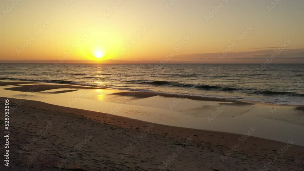 Beautiful sun rise over ocean waves at the beach in coastal South Carolina Beautiful sun rise over ocean waves at the beach in coastal South Carolina