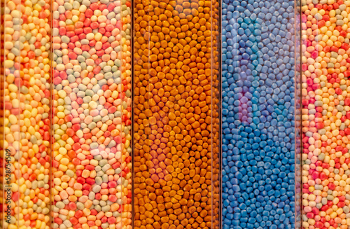 Multicolored sweets for background. Candies at market. Colorful sugar balls