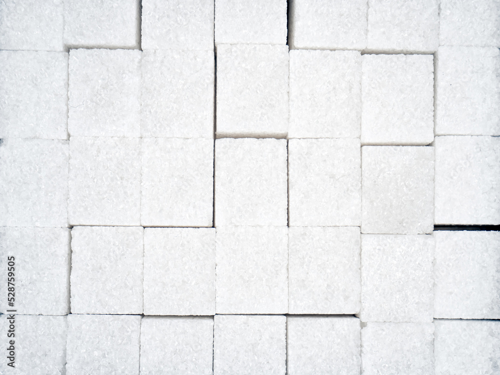 texture of white sugar cubes. texture of white sugar cubes.