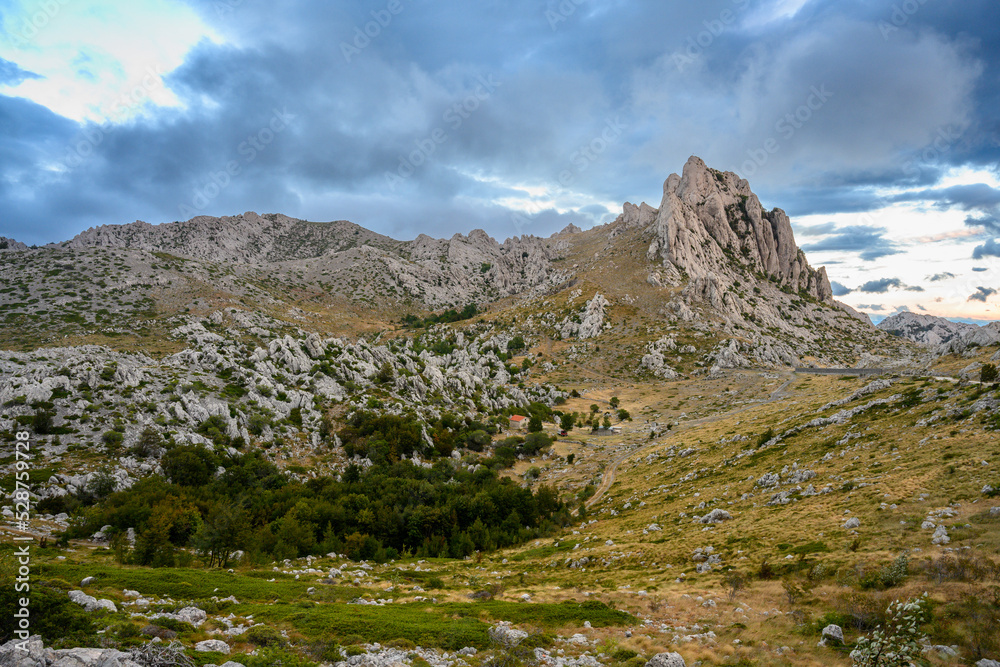 Colorful sky from the setting sun over Tulovegrede in the Croatian Velebit mountains.
