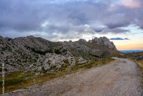 Colorful sky from the setting sun over Tulovegrede in the Croatian Velebit mountains.