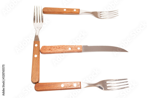 3 forks and 1 knife with wooden handles making the letter E on a white background
