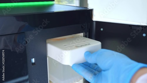 next generation sequencing flow cell of DNA sequencer. genetic engineering, genetic modification, designer baby and cloning concept. cancer screening and medical technology and therapy
