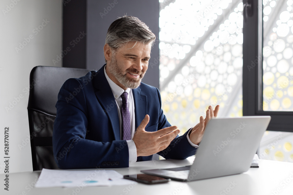 Video Conference. Handsome Middle Aged Businessman Having Web Call With Client Video Conference. Handsome Middle Aged Businessman Having Web Call With Client