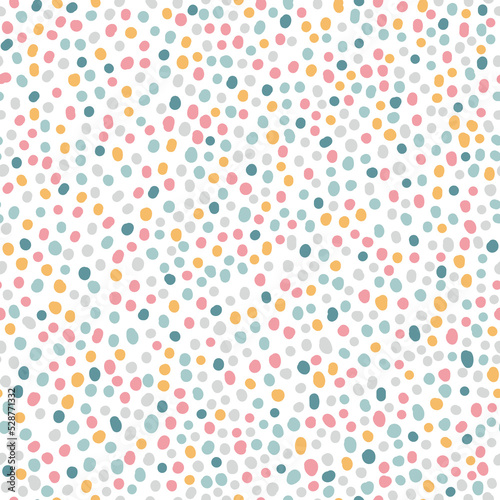 Cute hand drawn seamless pattern with Colorful Polka Dots. Abstract Multicolored doodle stain on white background. design for background, wallpaper, wrapping, fabric, and all your creative project.