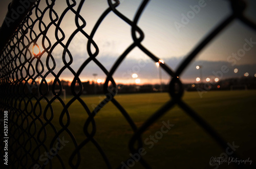 Soccer Field Through Fence