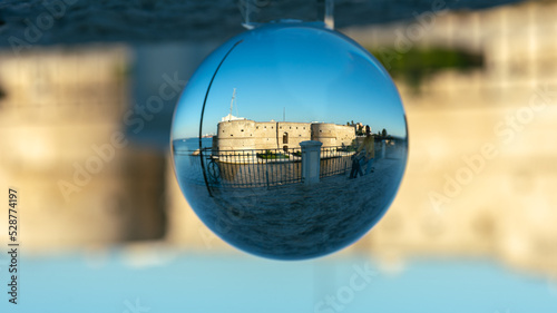 The Aragonese Castle in Taranto  in the South of Italy  included in a Crystal Sphere