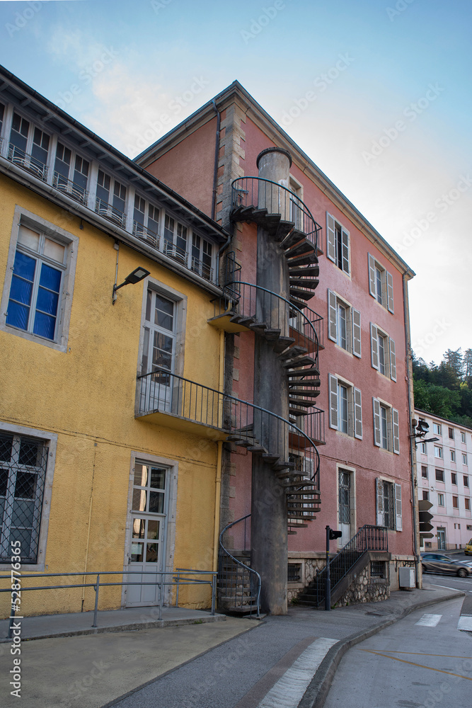 Architecture of colourful houses with spiral staircases in the town of Saint Claude Architecture of colourful houses with spiral staircases in the town of Saint Claude