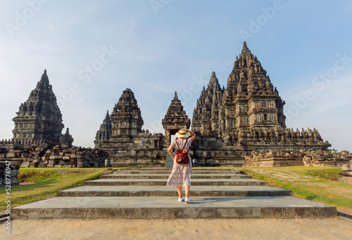 Fotografie Tourist looking at a landmark at the Prambanan temple