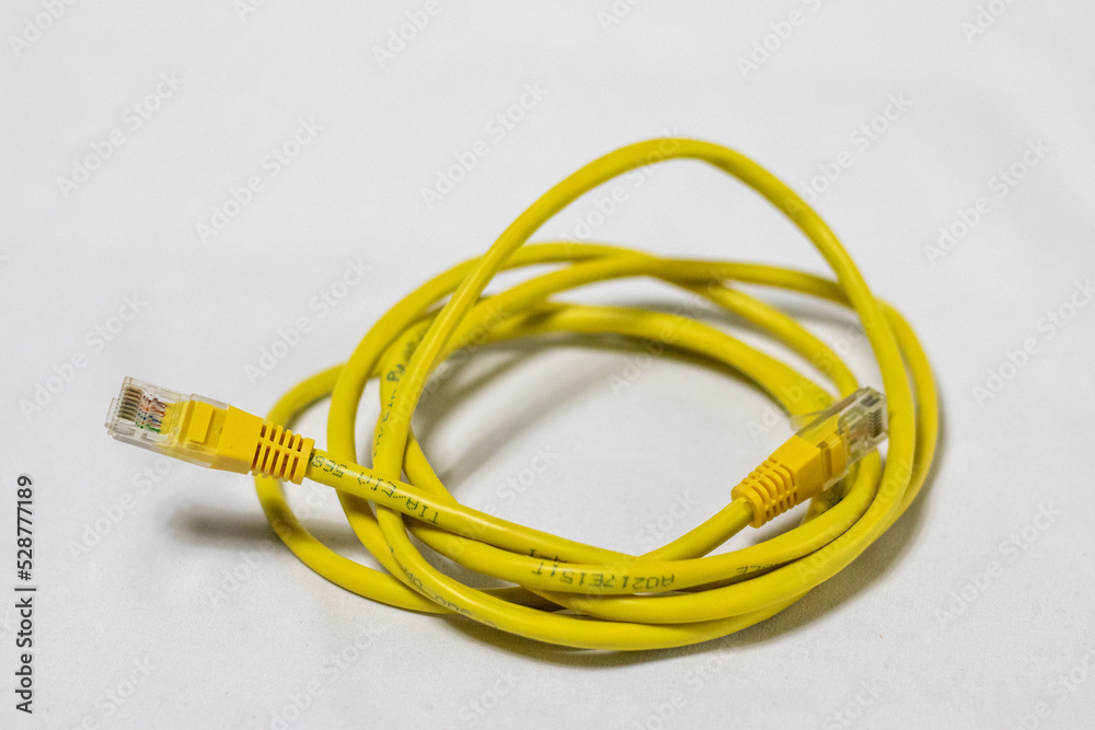 yellow network cable on white background yellow network cable on white background