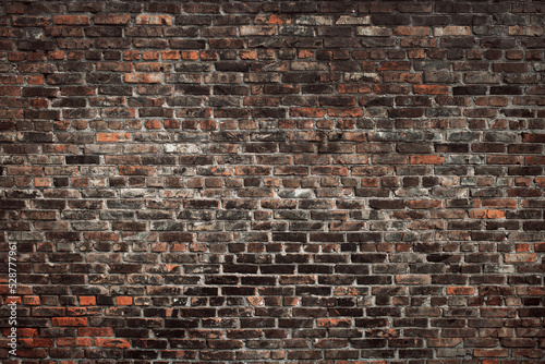 Fényképezés Old brown brick wall. Grunge background