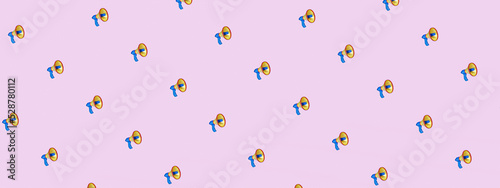 Diagonal array pattern of pink megaphones background, business announcement or communication concept, flat lay top view from above, 3D render.