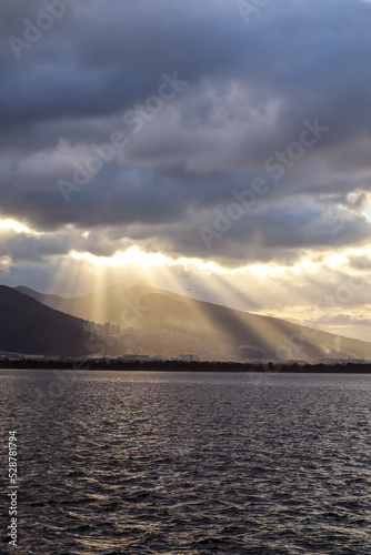Mountains and the Aegean Sea on the coast of Izmir with copy space and sunrays