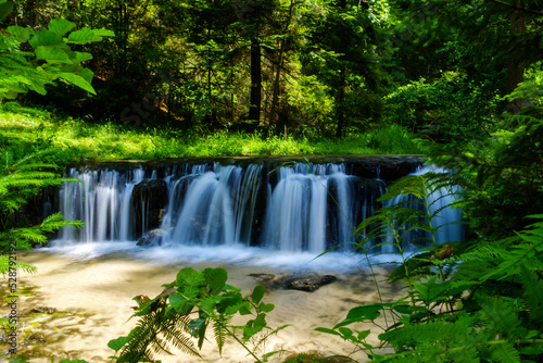 waterfall in the forest © Radosaw