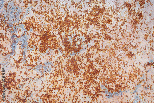 Red rust on a metal surface, background.