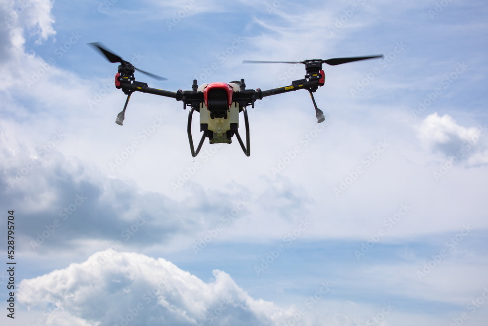 A modern solution in agricultural. Use of robotic systems with agriculture spraying drone fly to sprayed spraying chemical from insects - insecticides, fungicides, acaricide, or herbicides from weeds. A modern solution in agricultural. Use of robotic systems with agriculture spraying drone fly to sprayed spraying chemical from insects - insecticides, fungicides, acaricide, or herbicides from weeds.