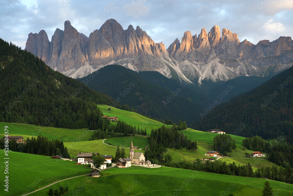 Valley in Dolomite Alps at sunset in Italy