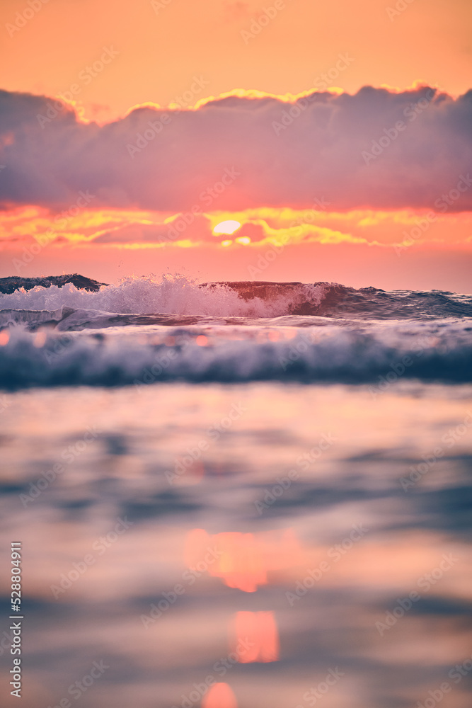 Waves in colorful Sunset. High quality photo