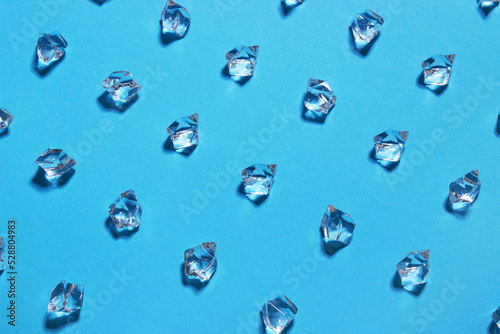 Ice cubes on blue