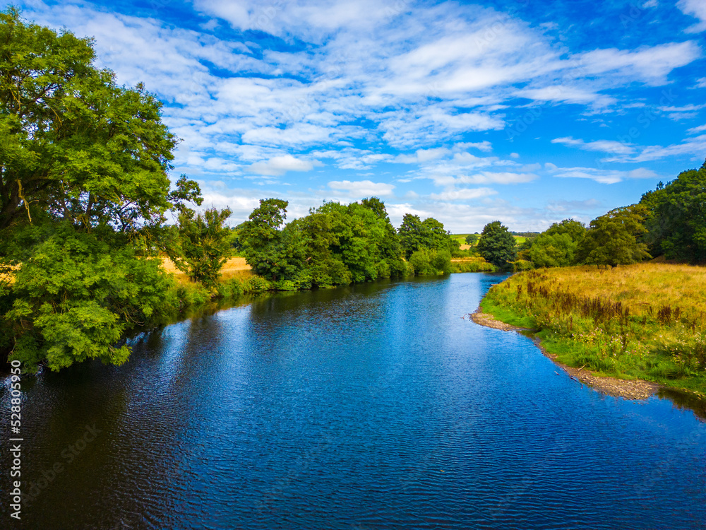 Aerial view of River Wharfe on a sunny, summer day