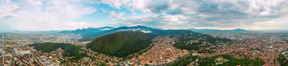Aerial drone panoramic view of the historic centre of Brasov, Romania