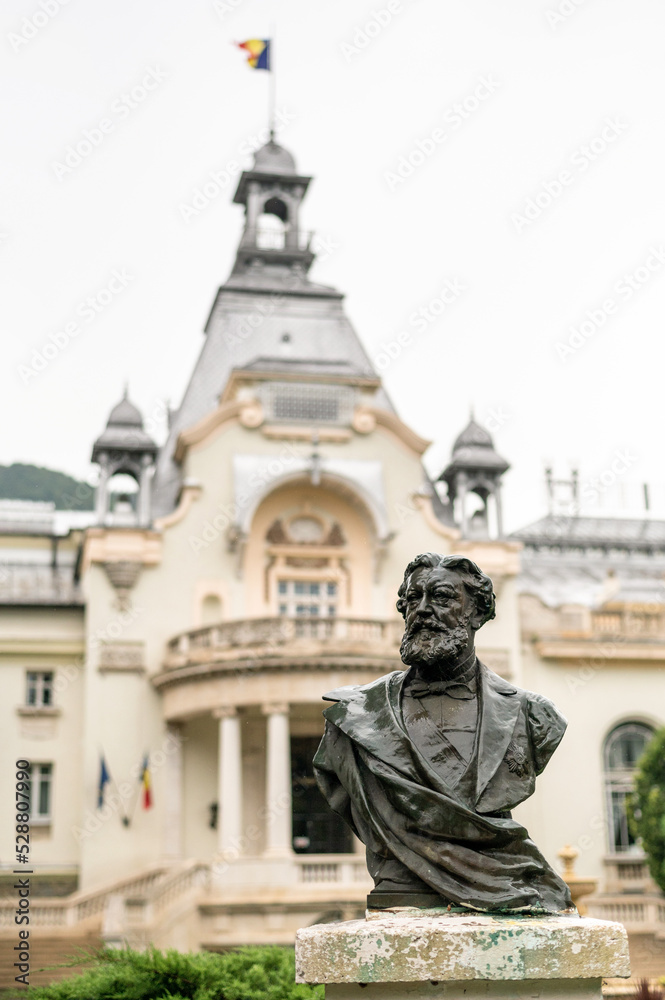 Dimitrie Gika statue and Sinaia casino in Romania Dimitrie Gika statue and Sinaia casino in Romania