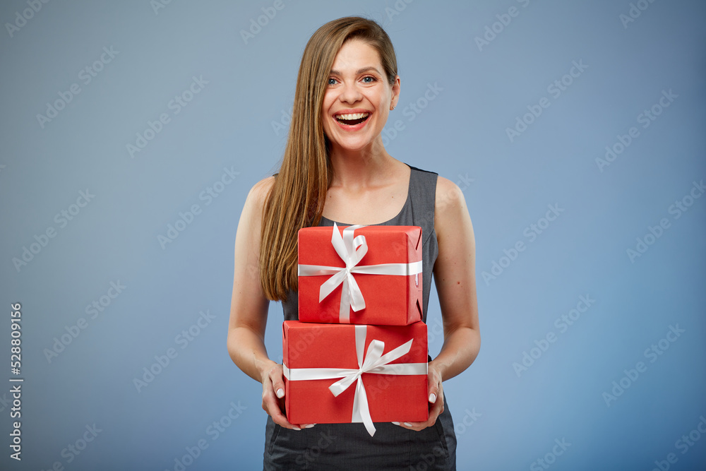 Business woman holding paper gift boxes. Business woman holding paper gift boxes.