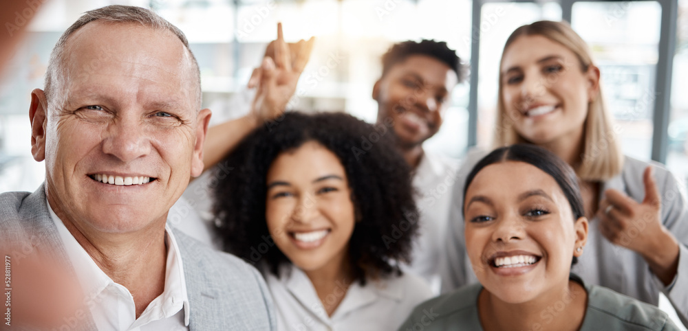 Selfie, smile and happy team at work having fun, bonding and enjoying their lunch break at the office. Friends, diversity and business people smiling for a picture together to post it on social media