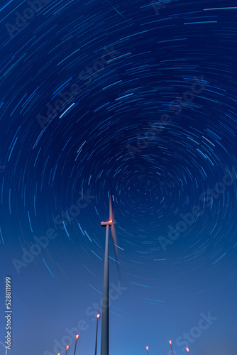wind turbine farm at night 