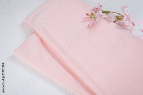 Solid color plush fabric of delicate color on a light background