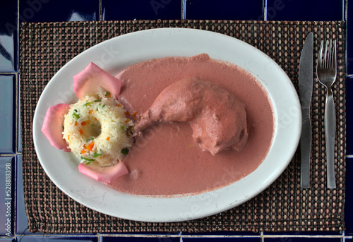 Typical Mexican dish mole rosa with rice photo