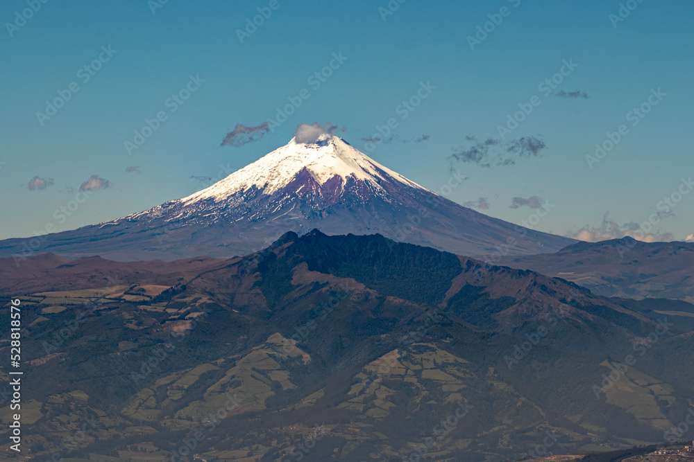 Majestic Cotopaxi volcano seen on a summer morning from the city of Quito.
