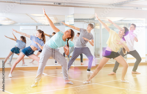Active teens learn new dance moves in dance studio