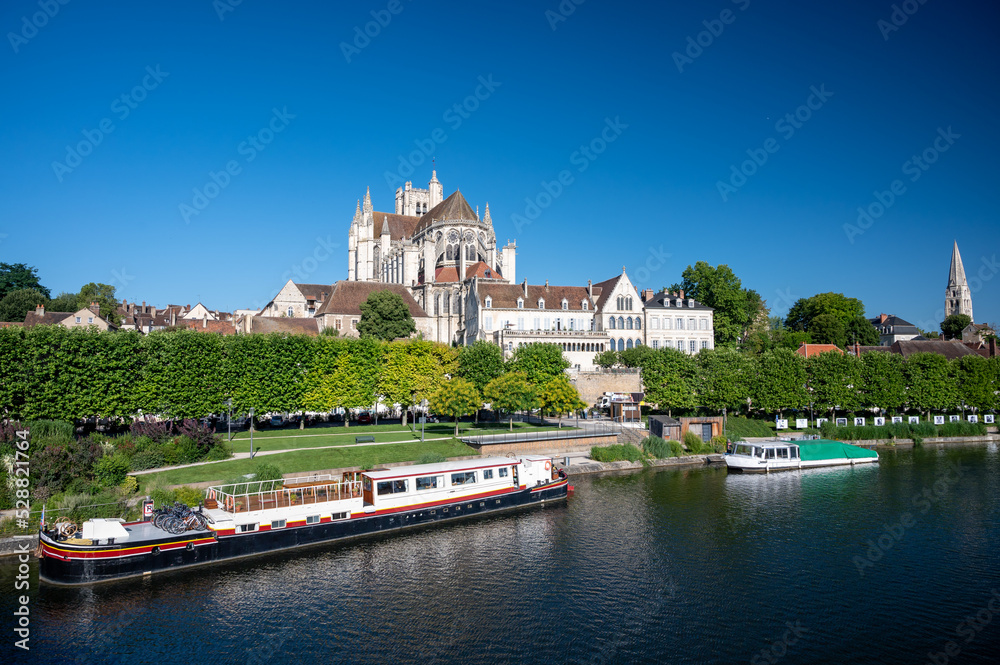 Naklejka premium Old streets and houses of Auxerre, medieval city on river Yonne, north of Burgundy, France