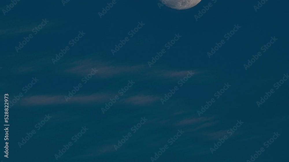 Full moon is moving across light clear blue sky background Time Lapse,Amazing moon High quality footage Timelapse 60FPS. Full moon is moving across light clear blue sky background Time Lapse,Amazing moon High quality footage Timelapse 60FPS.