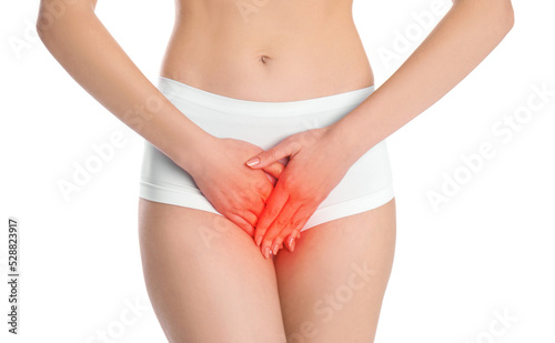 Woman suffering from vaginal yeast infection on white background, closeup photo