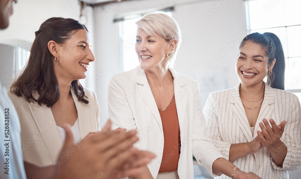 Team success, collaboration and teamwork of a office work group celebration of project completion. Diversity of professional business woman with a happy smile about staff support clapping together Team success, collaboration and teamwork of a office work group celebration of project completion. Diversity of professional business woman with a happy smile about staff support clapping together