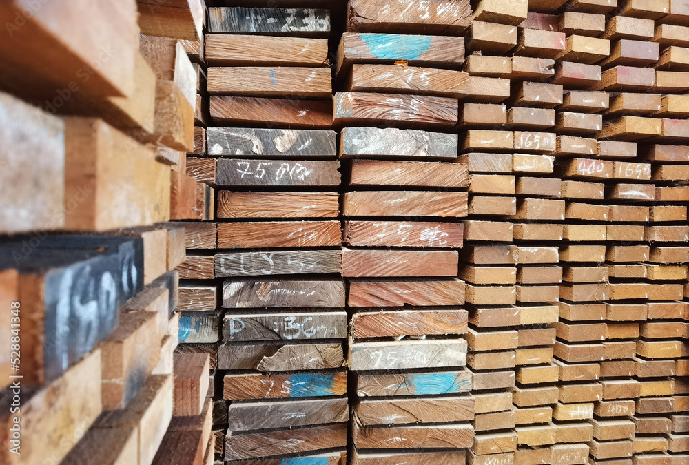 Piles of wooden boards in the warehouse 