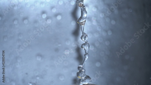 water drop falling closeup image