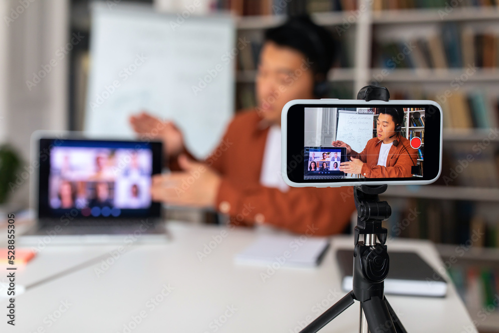 Japanese Teacher Video Calling Via Cellphone Teaching Online In Classroom